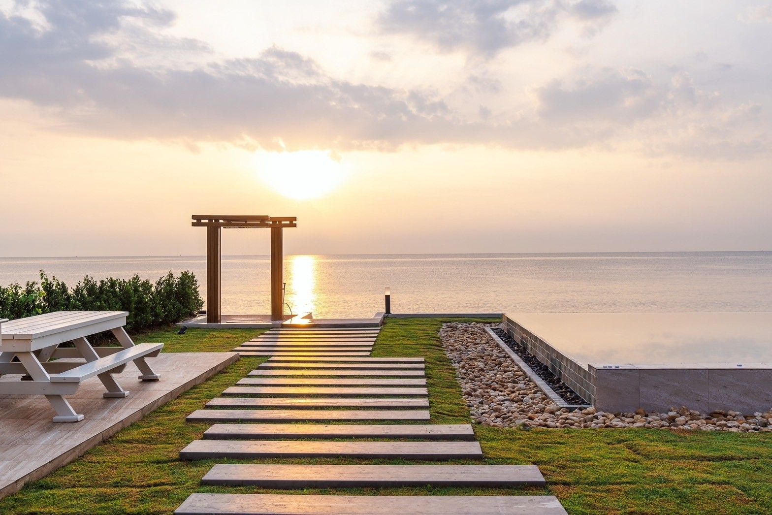 Beachfront access and pool at All About VII Pool Villa, near Bangket Beach, Cha Am. Walkway to the sea.