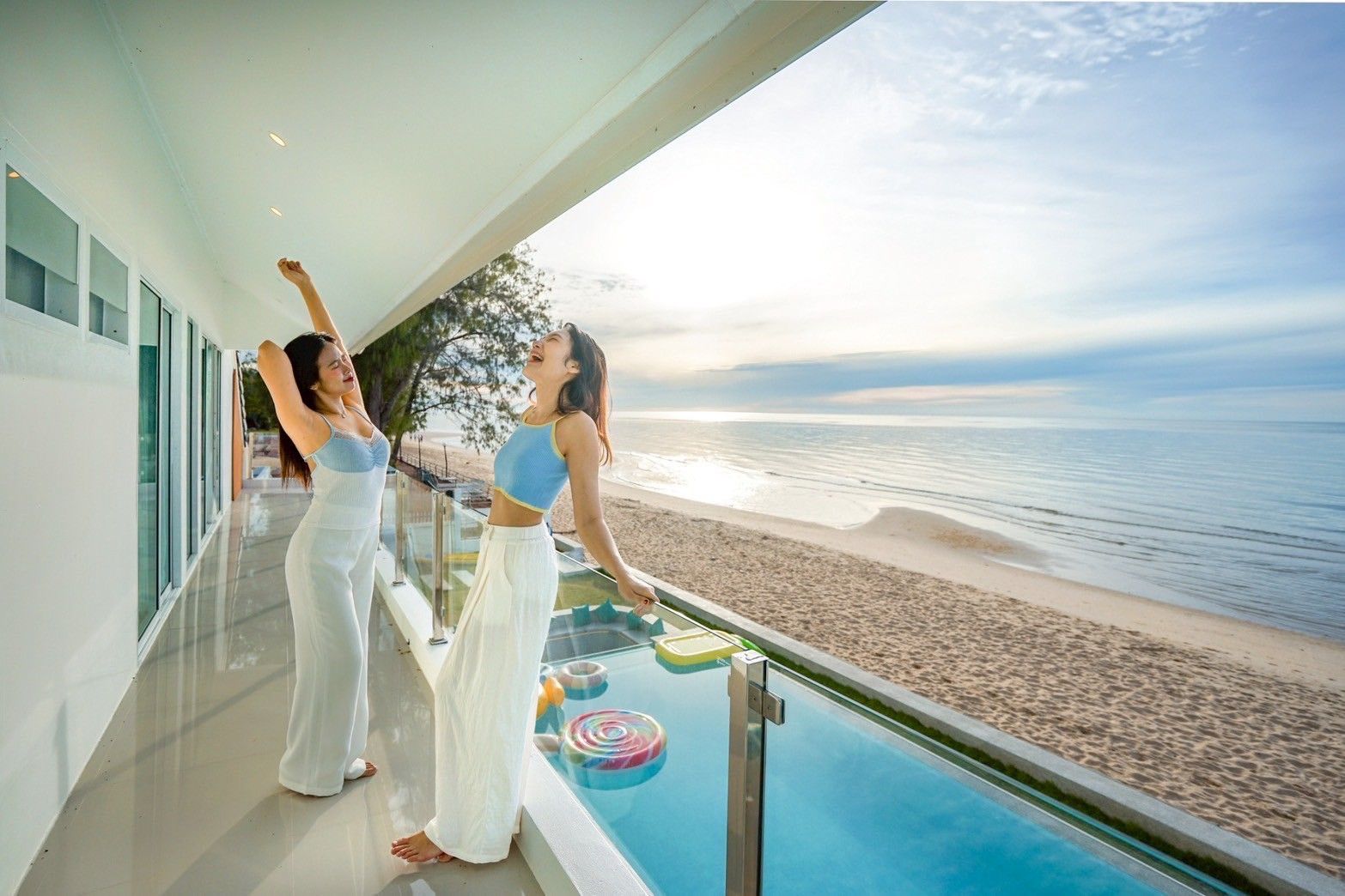 Pool with slide and beach behind at Bubble Sea VII