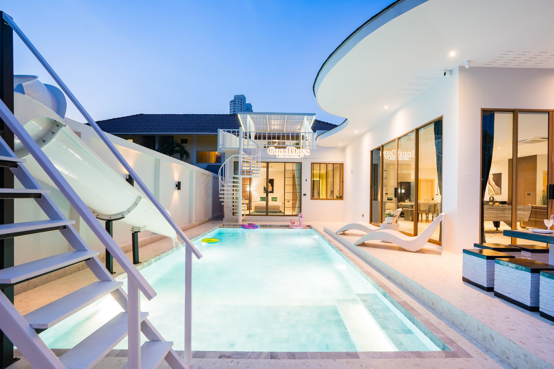 Good Day V Pool Villa in Jomtien, South Pattaya. Private pool with waterslide, sun loungers, and rooftop access.