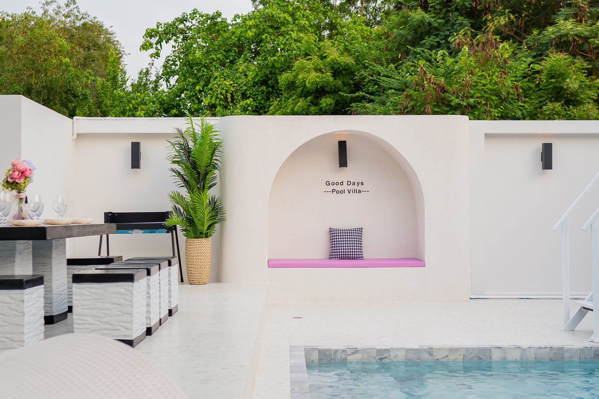 Poolside dining and seating nook at Good Days Pool Villa, South Pattaya. Relax by the pool in style.