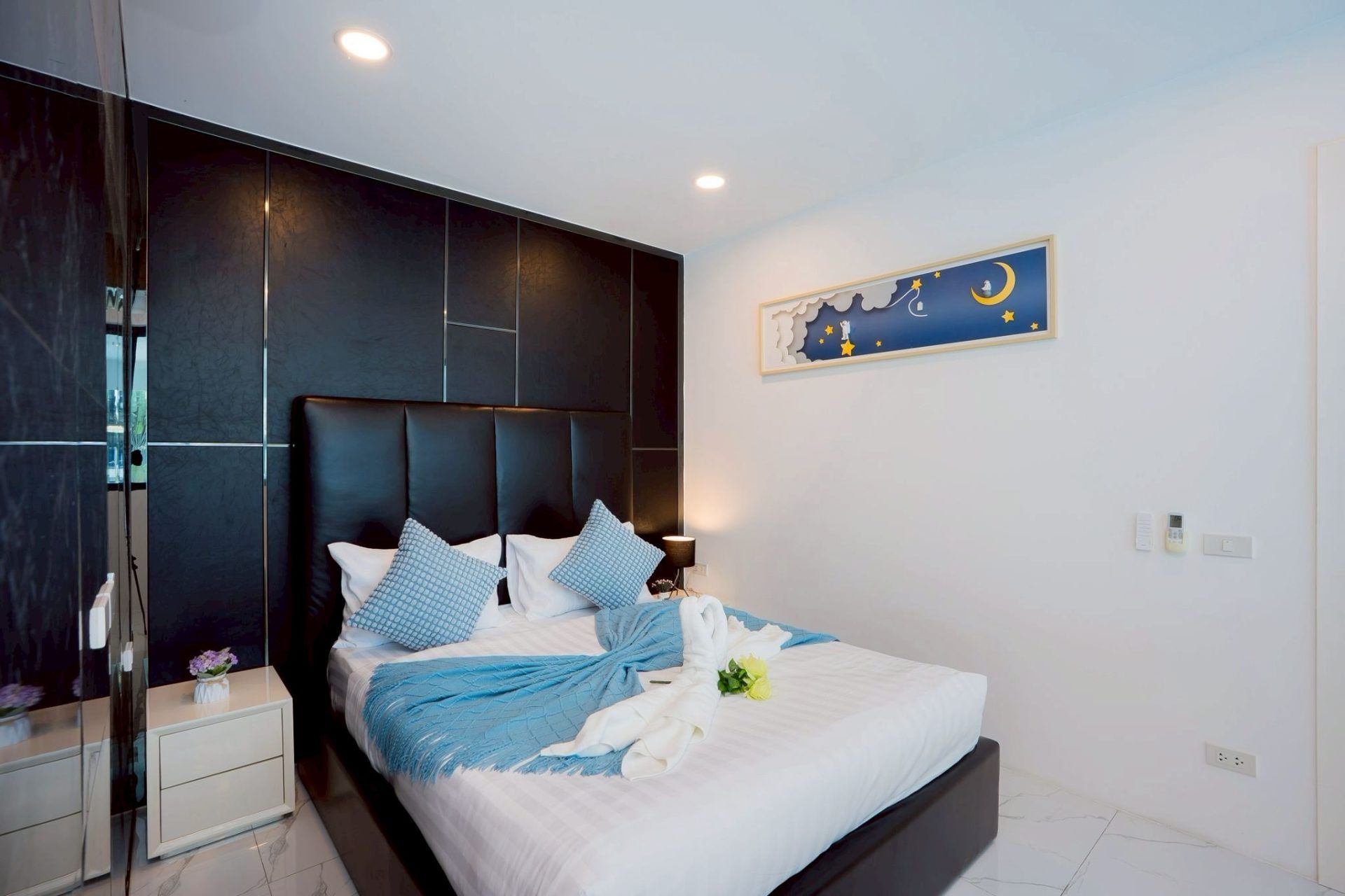Twin bedroom with towel swans at Land VIII Pool Villa