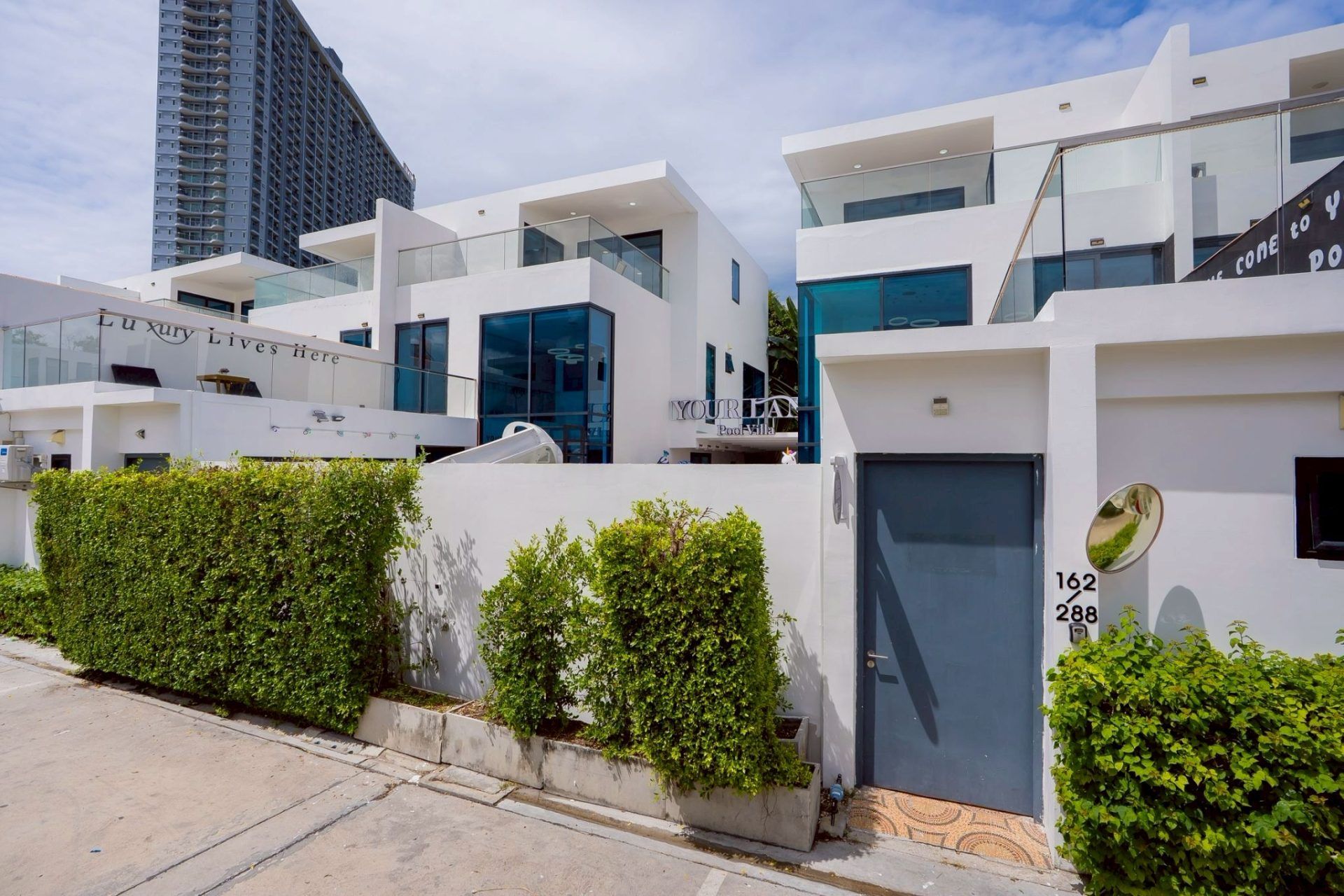 Dining table set for large group at Land VIII Pool Villa