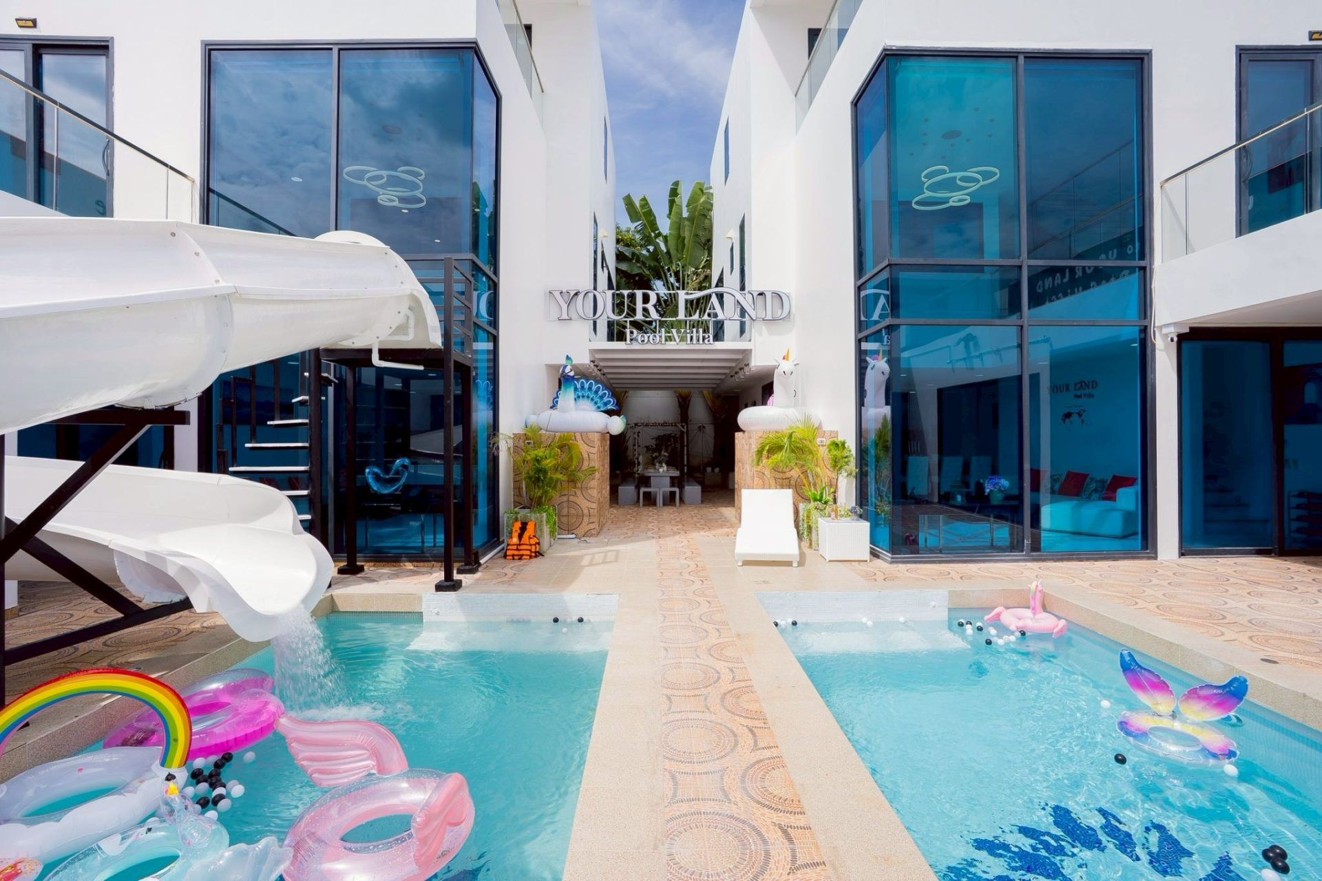 Pool with LED lighting at night at Land VIII