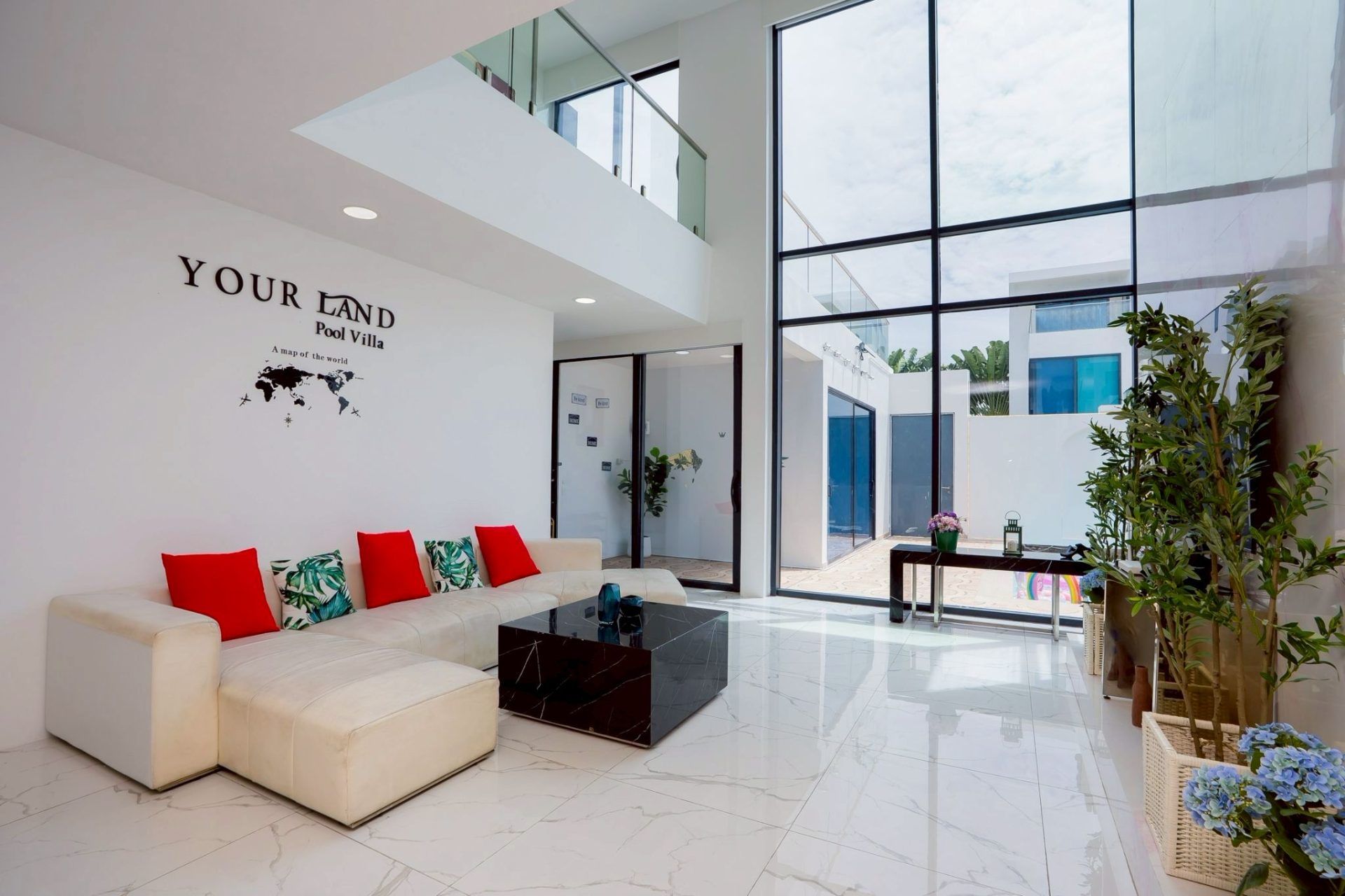 King bedroom with dark headboard at Land VIII