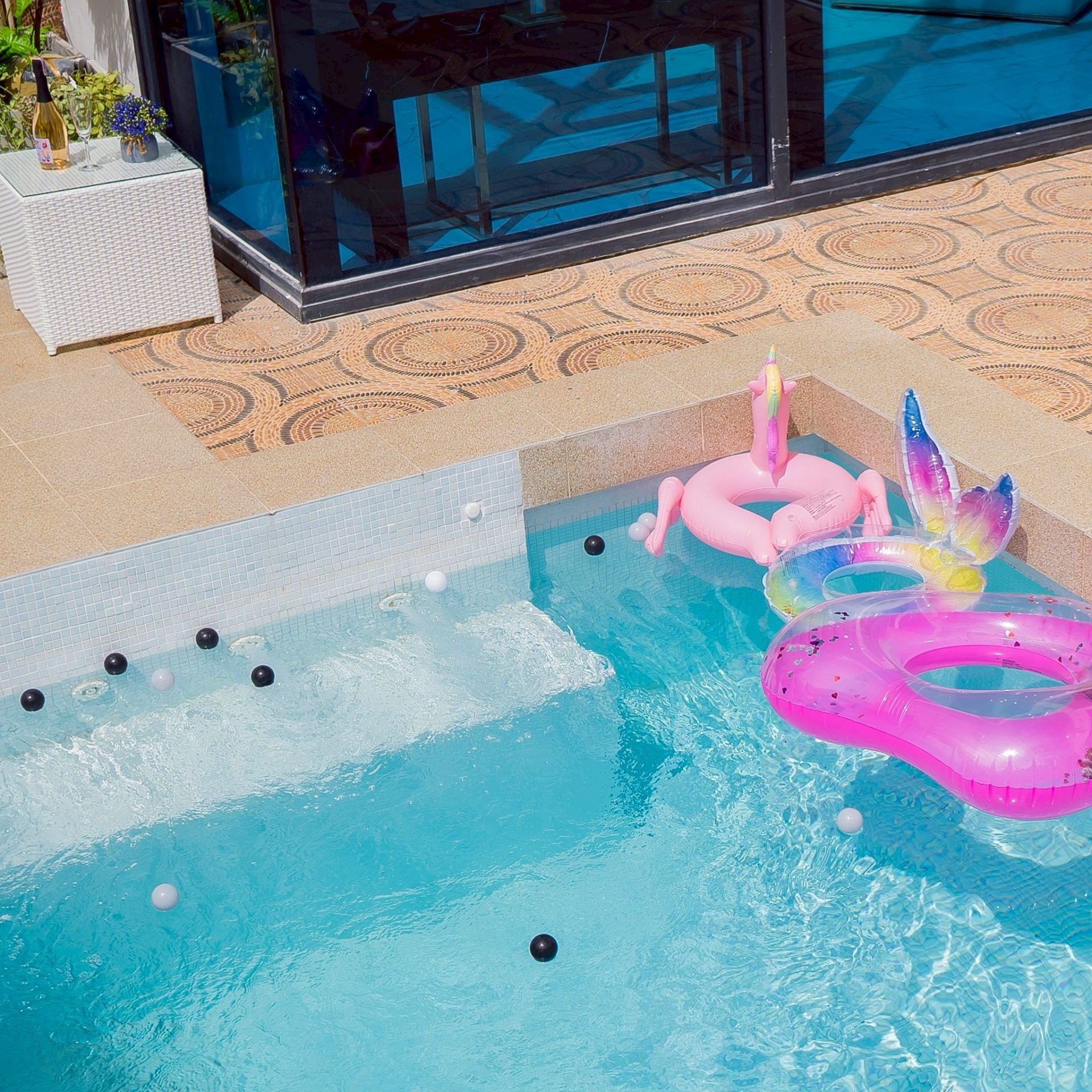 Water slide and pool from above at Land VIII Pool Villa