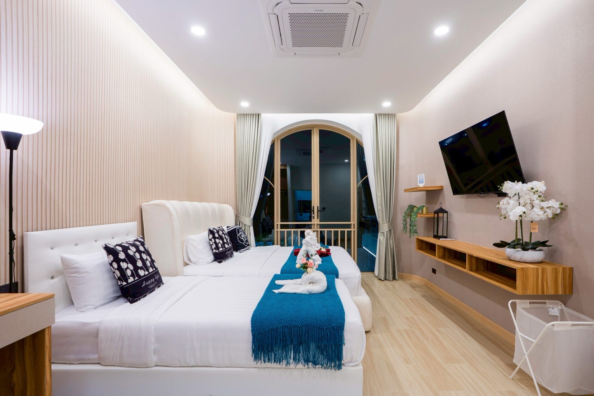 Villa front facade at dusk at Noble V Pool Villa