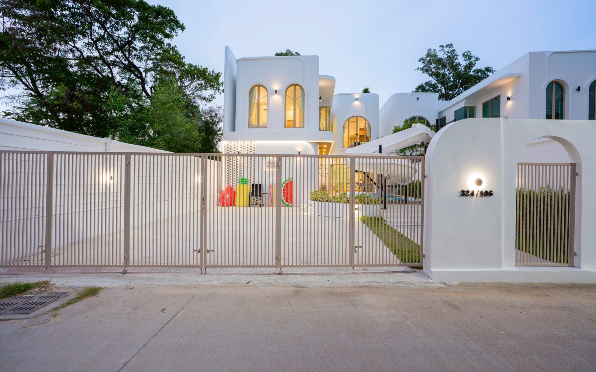 King bedroom with pool view at Noble V