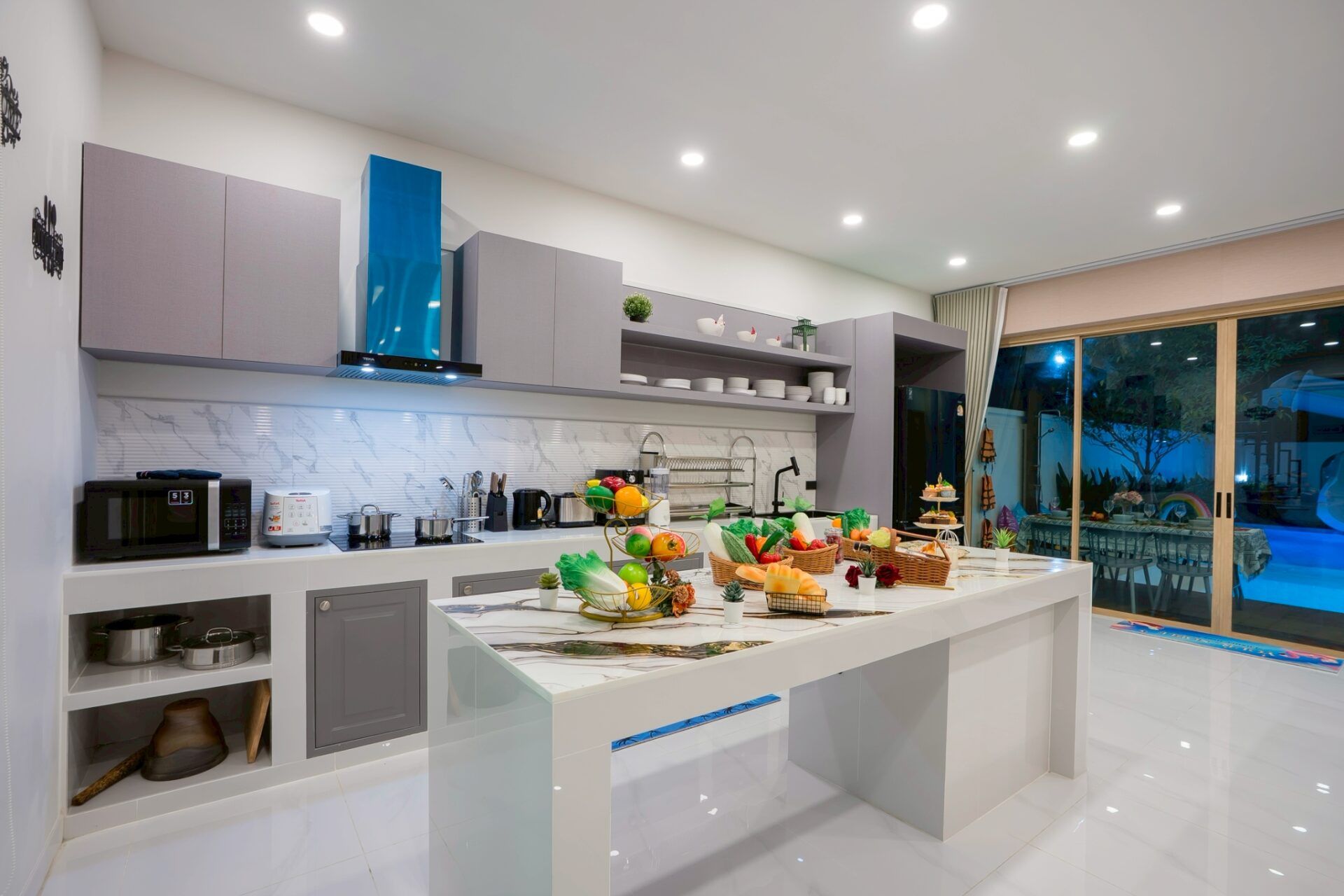 Kitchen with island counter at Noble V Pool Villa