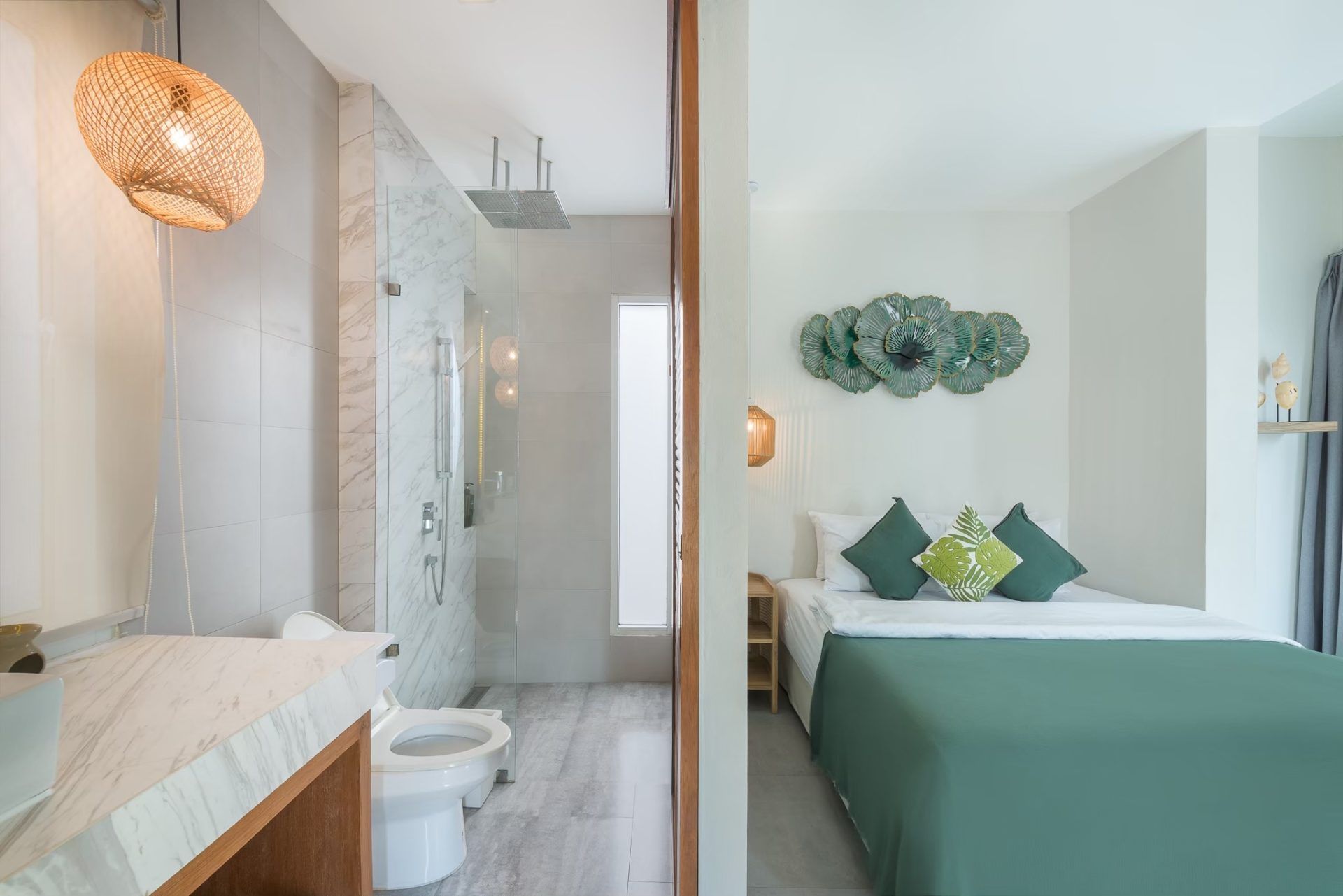 Bedroom view into ensuite bathroom at Vela VI pool villa, หาดปึกเตียน ชะอำ. Features walk-in shower and modern fixtures.