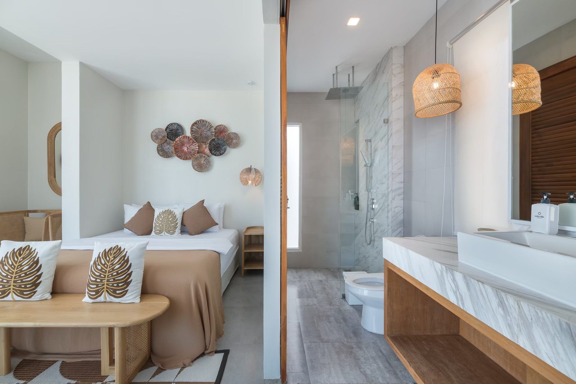 Vela VI Pool Villa bedroom and bathroom suite in หาดปึกเตียน ชะอำ. Features a king bed, walk-in shower, and modern design.