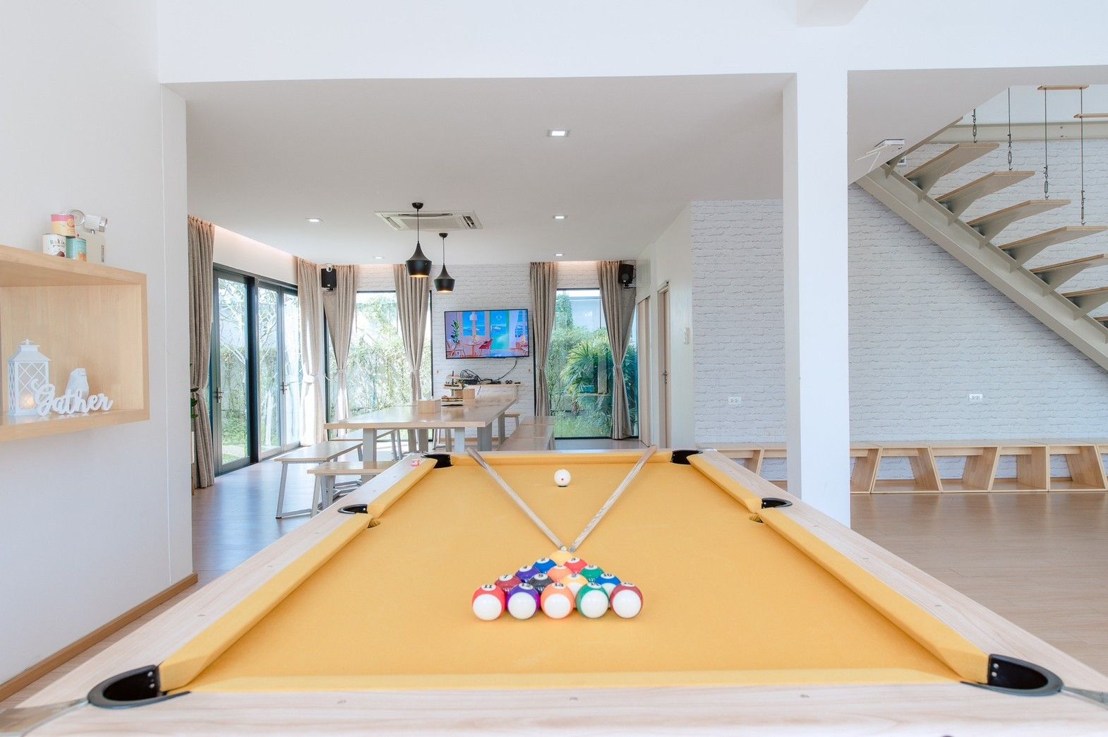 Billiard table with yellow felt at Pool Lay AII Pool Villa, Na Jomtien, Pattaya. Entertainment and games.