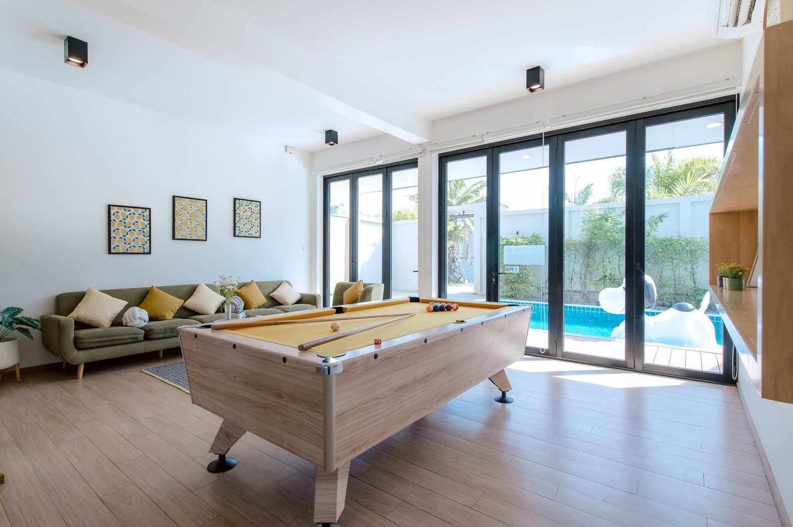 Billiards room with pool view at Pool Lay AII Pool Villa, Na Jomtien. Play pool and enjoy the view.