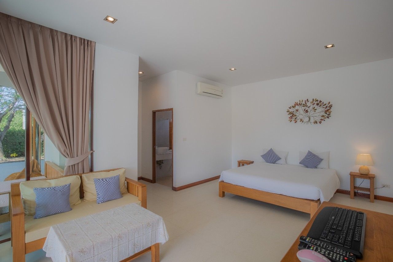 Spacious bedroom with sofa in Proud I Pool Villa, Hua Hin, Thailand