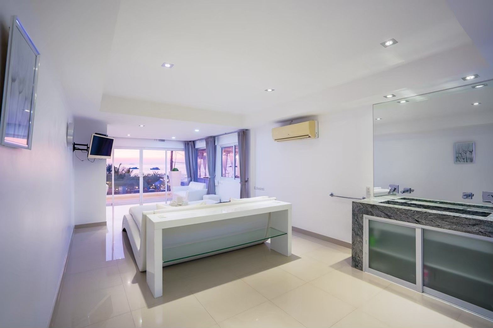 Open concept bathroom and living area at Royal Beach X Pool Villa, ติดทะเลนาจอมเทียน พัทยาใต้. View of ocean.