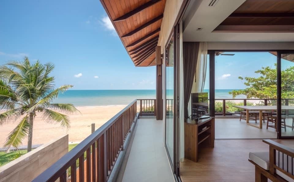 Ocean view from the balcony of Salty Sand Pool Villa. Beachfront access and outdoor living in Thailand.