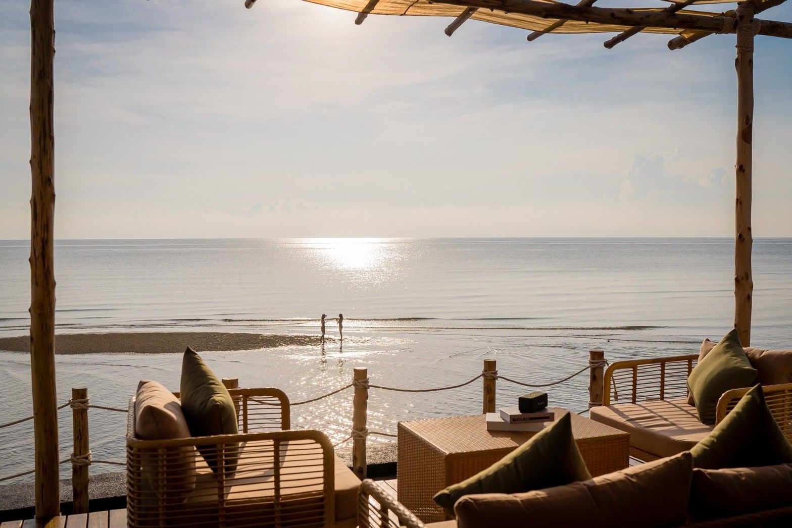 Beachfront lounge seating at Sea Fan IV Beachfront Pool Villa near Huahin airport. Ocean view from the terrace.