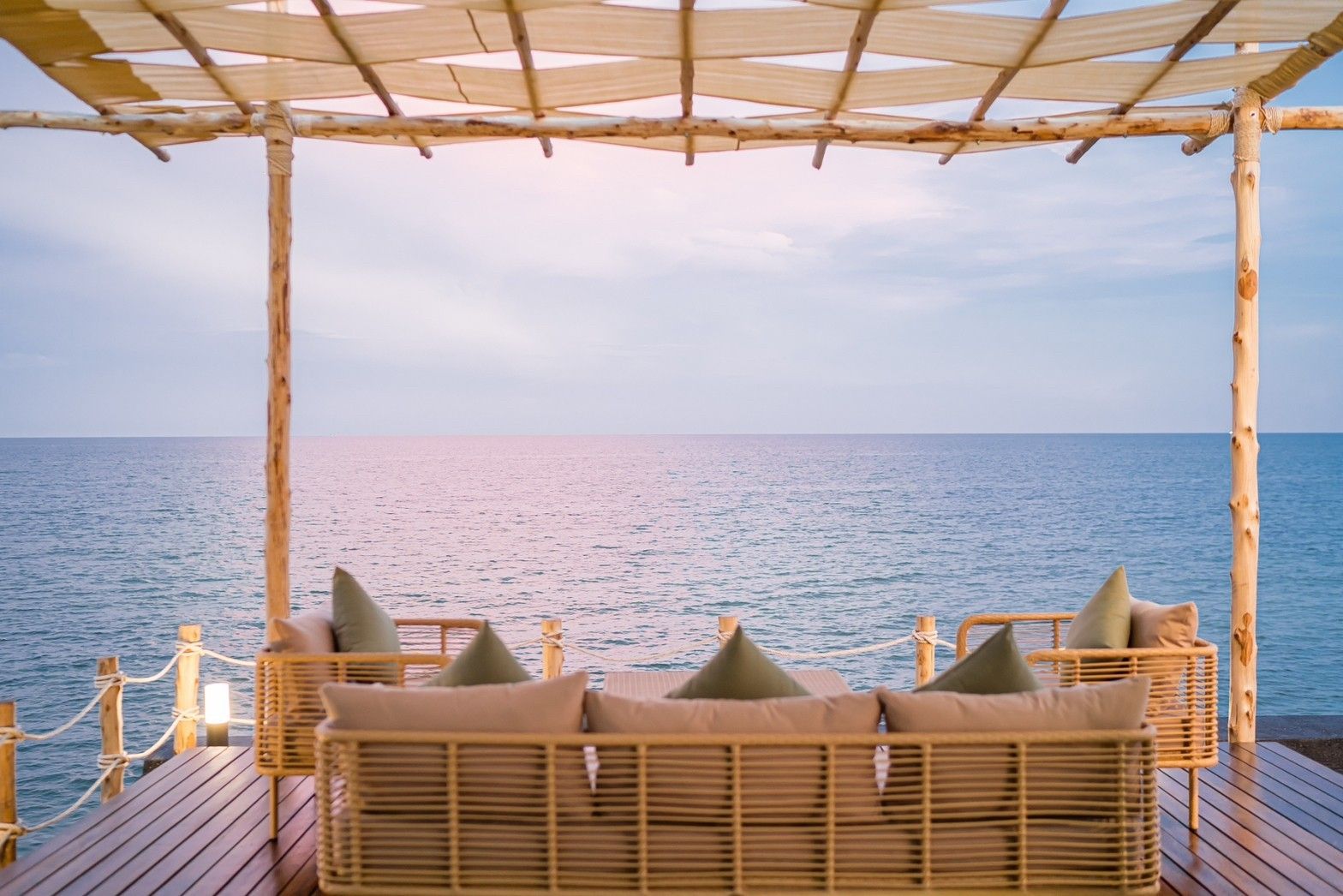 Ocean view from the outdoor lounge at Sea Fan IV Beachfront Pool Villa near Huahin airport. Relax on the patio.