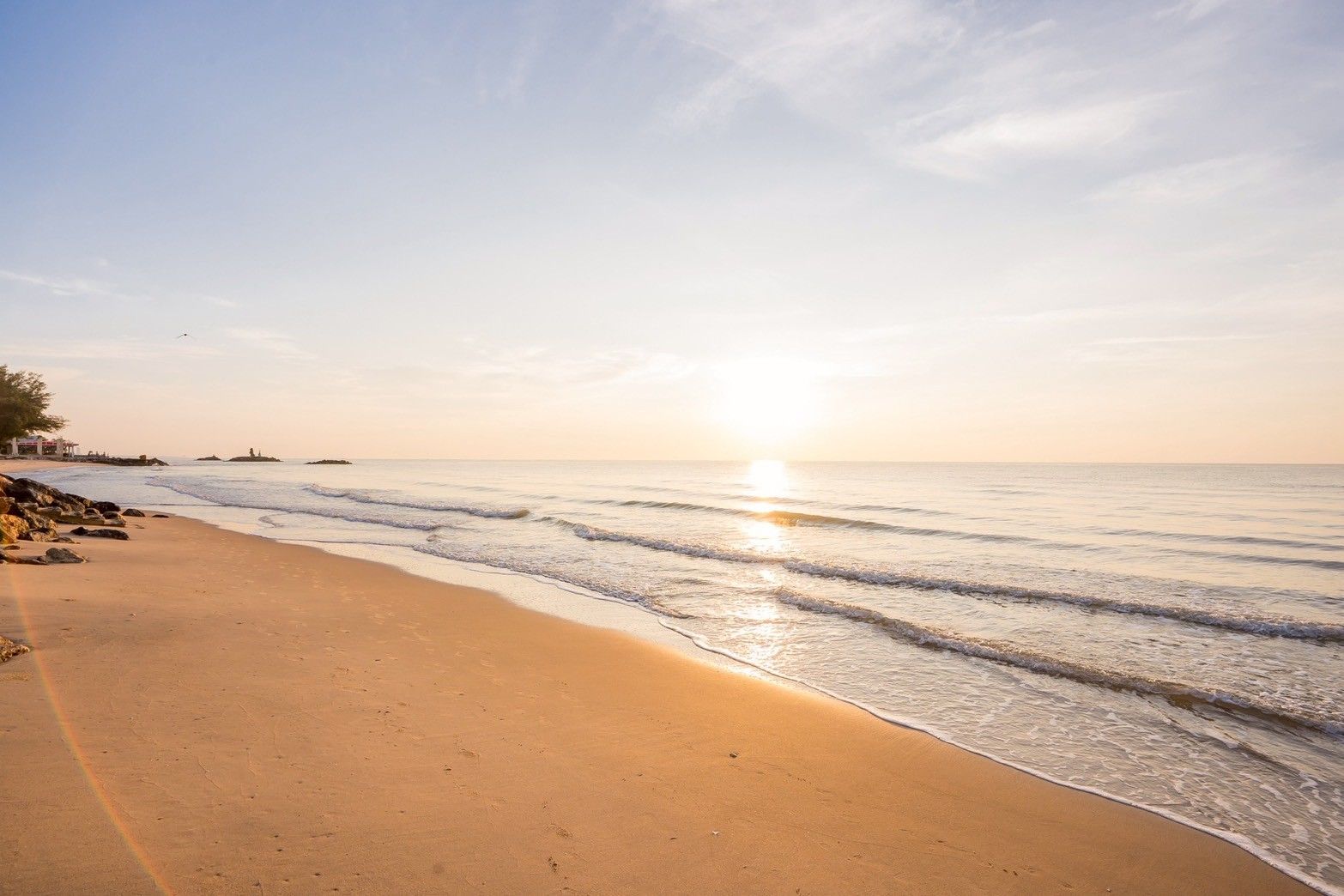 Sunrise view of the beach near Spirit V Pool Villa, หาดปึกเตียน-ชะอำ. Calm ocean waves and golden sand.