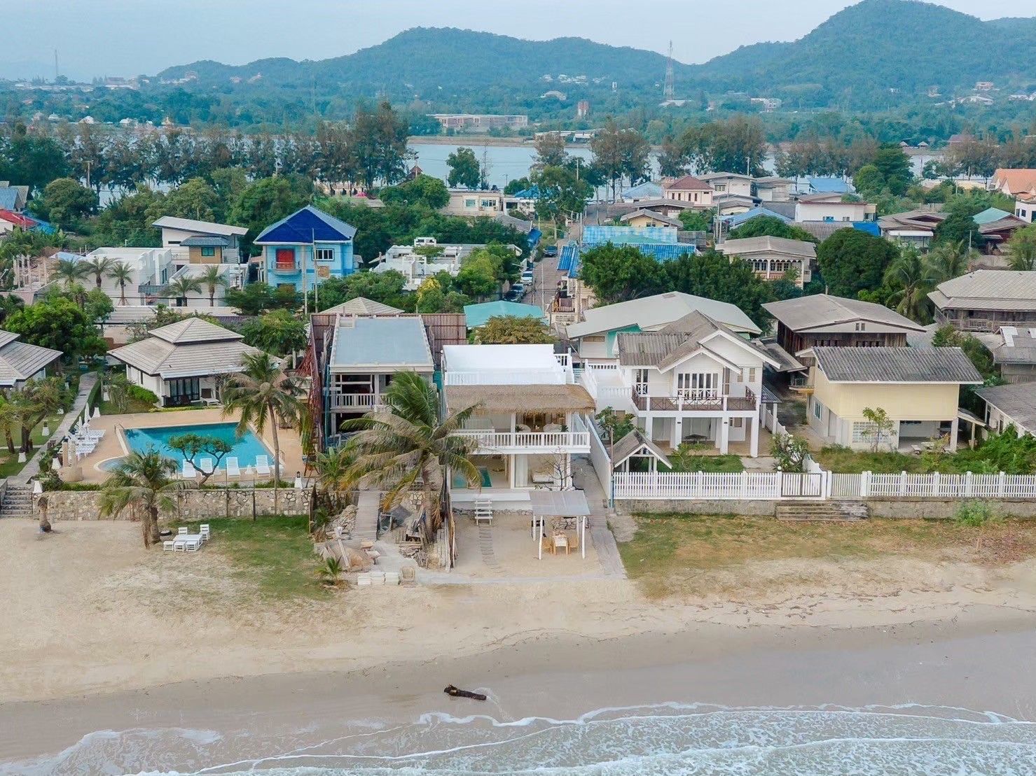 Aerial view of Story II Pool Villa Hua-Hin, beachfront property in เขาเต่า. See the villas and surrounding neighborhood.