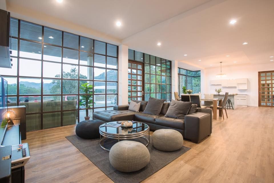 Spacious open-plan living area with mountain views at The Valley Khaoyai V Villa, Khao Yai, Thailand.