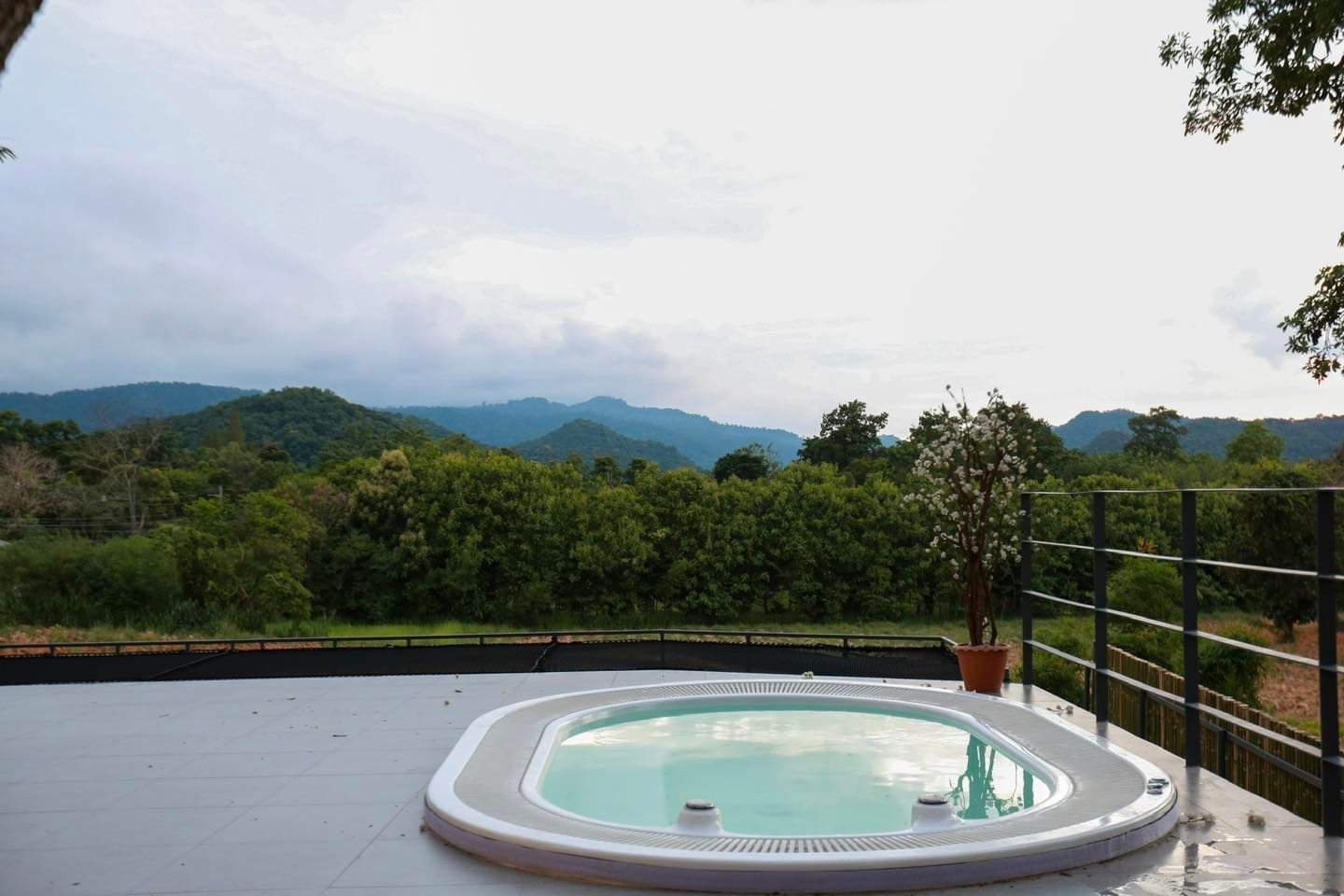 Jacuzzi at Tree House III Pool Villa, Khao Yai. Enjoy mountain views from this relaxing pool villa near the national park.