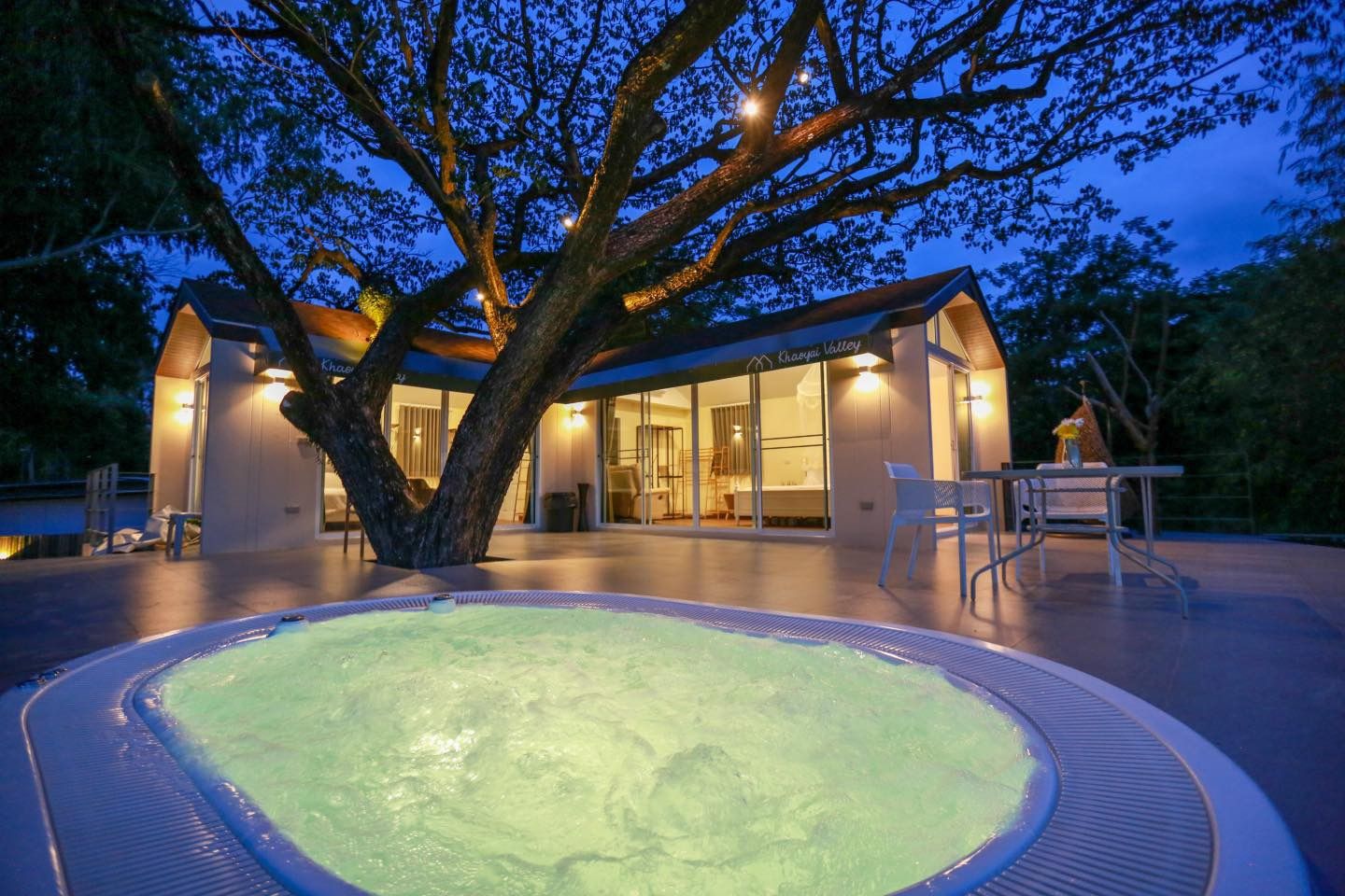 Glowing jacuzzi at Tree House III Pool Villa, Khao Yai. Enjoy a relaxing soak under the stars near the national park.