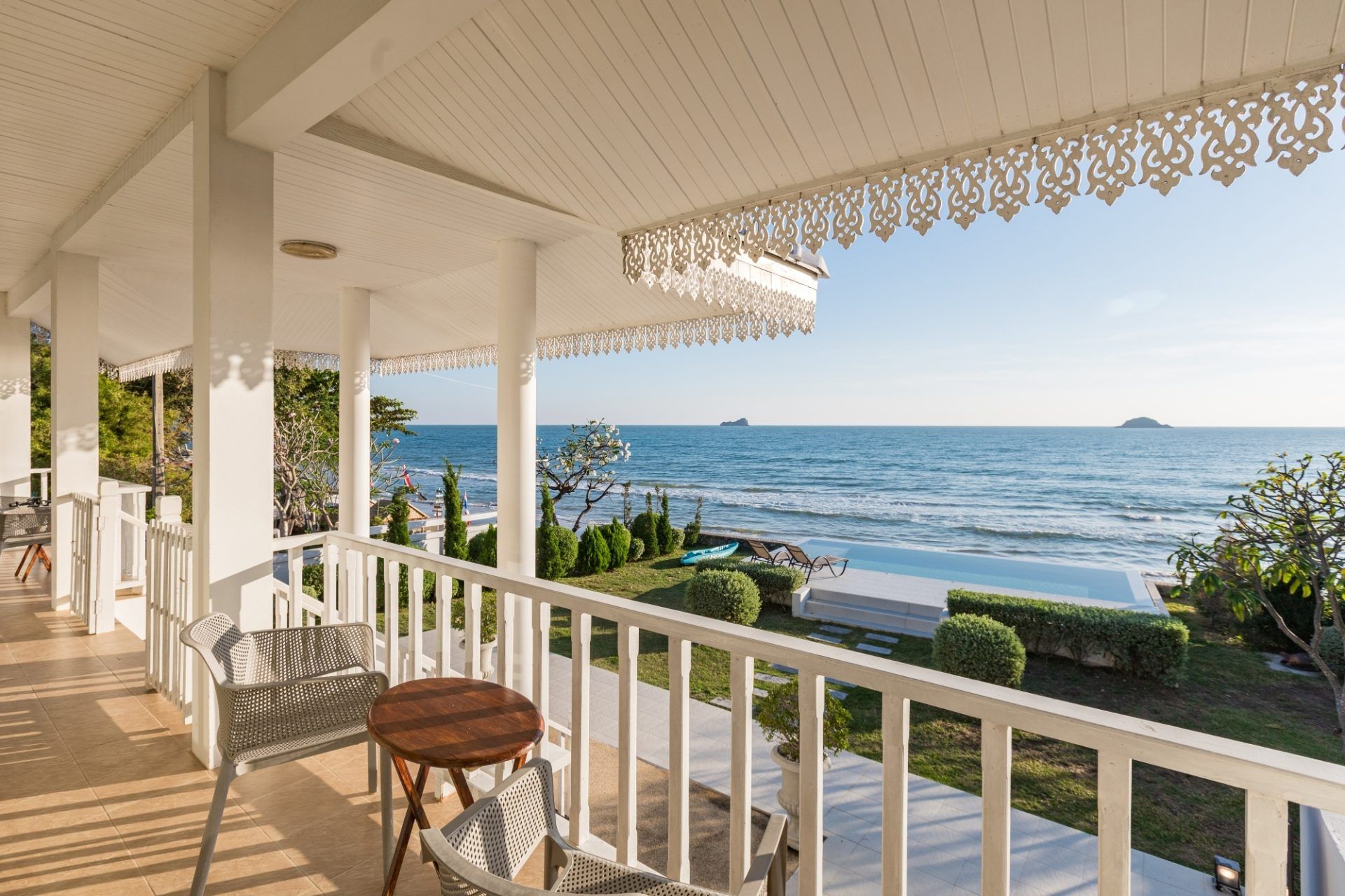 Ocean view from the terrace at Twenty-Six Pool Villa Hua-hin. Outdoor seating area overlooking the pool and sea in หัวหิน 101