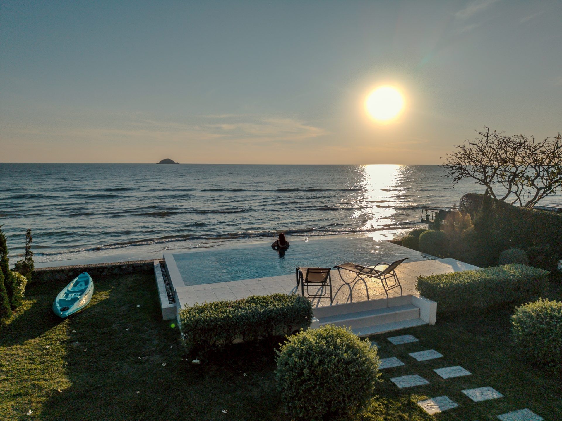 Sunset view from the infinity pool at Twenty-Six Pool Villa Hua-hin, หัวหิน 101 ประจวบฯ. Oceanfront pool villa.