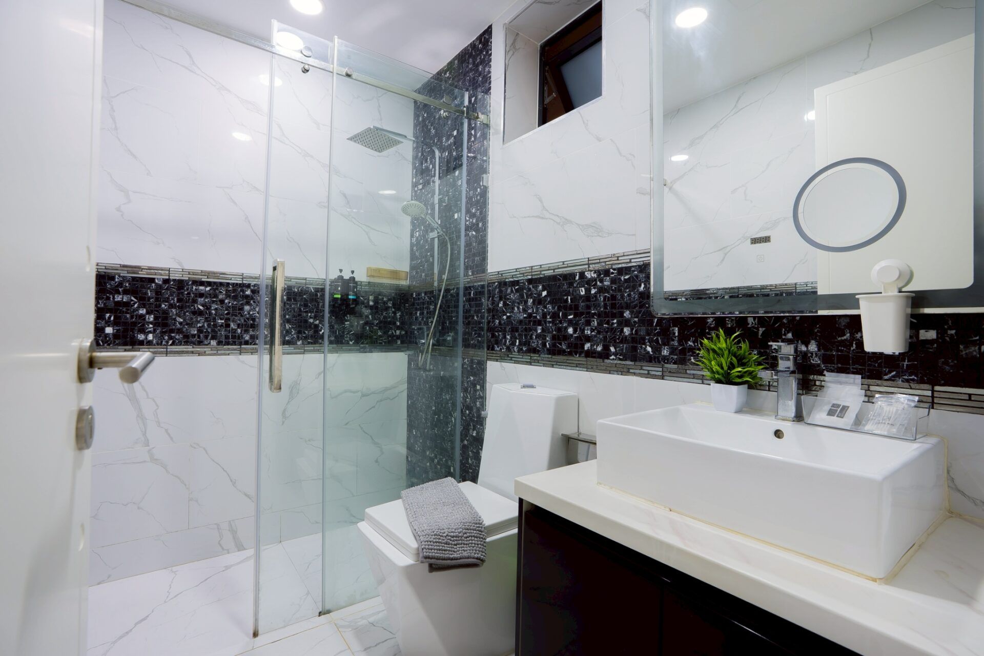 Pool area with slide and covered lounge at Your Space IV