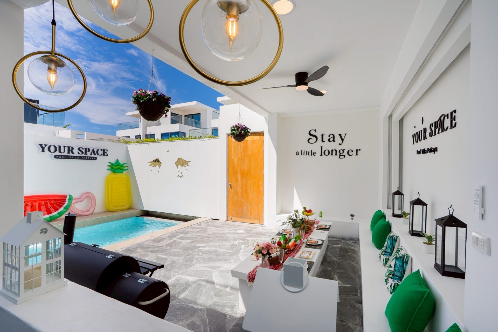 Pool area with covered lounge and BBQ at Your Space IV