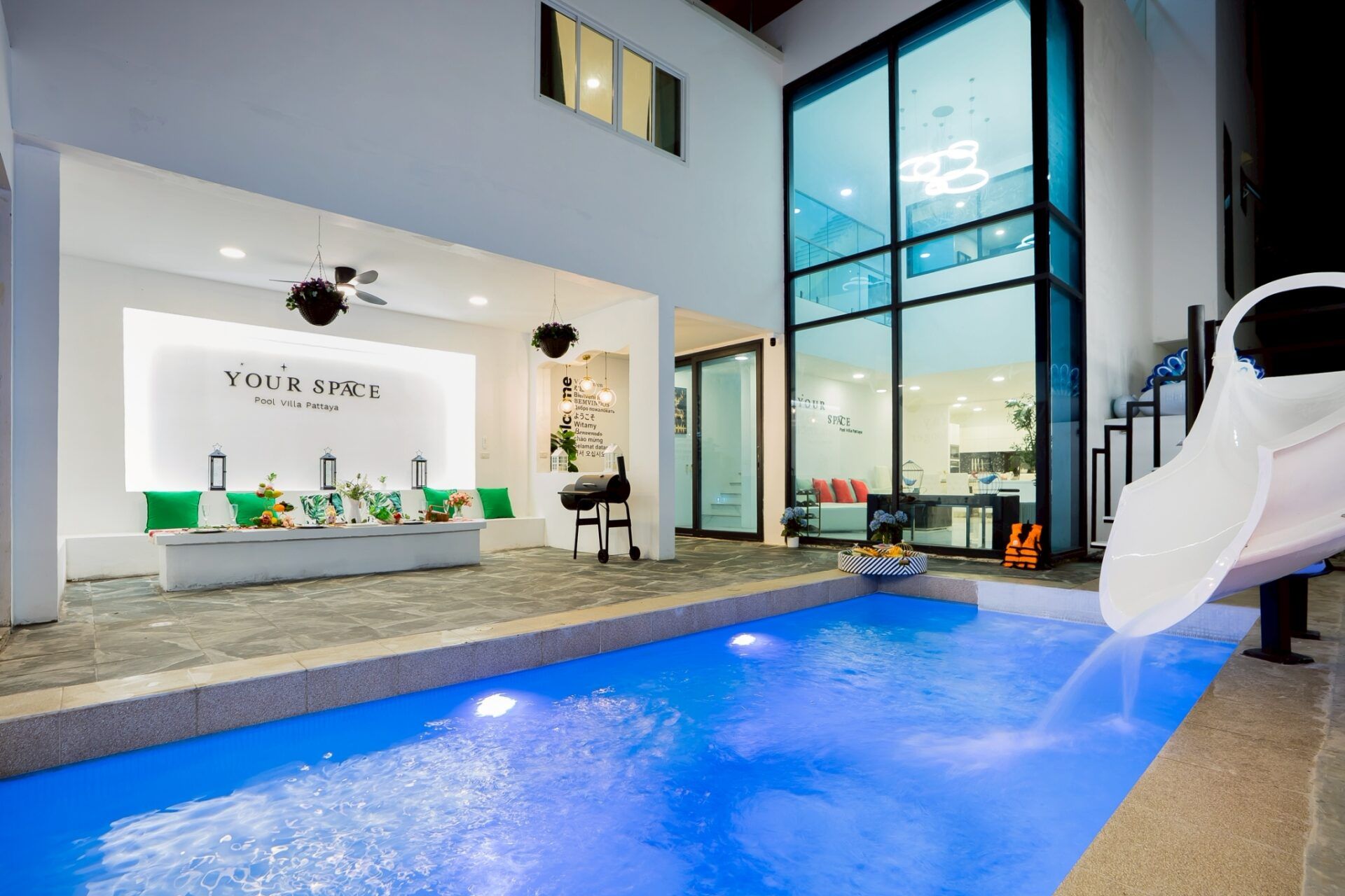 Pool at night with water slide and BBQ at Your Space IV