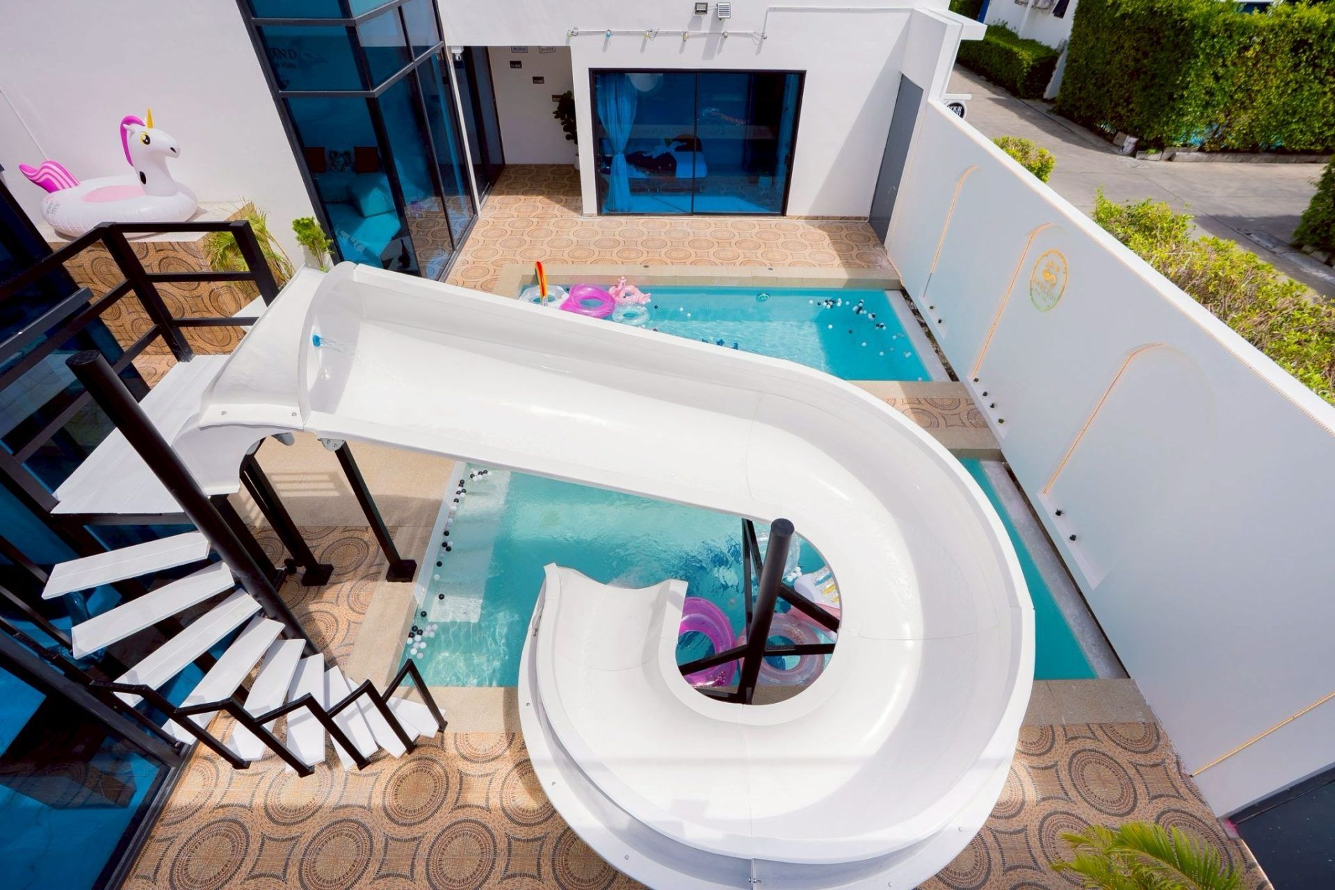 Pool area with lounging space at Land VIII Pool Villa
