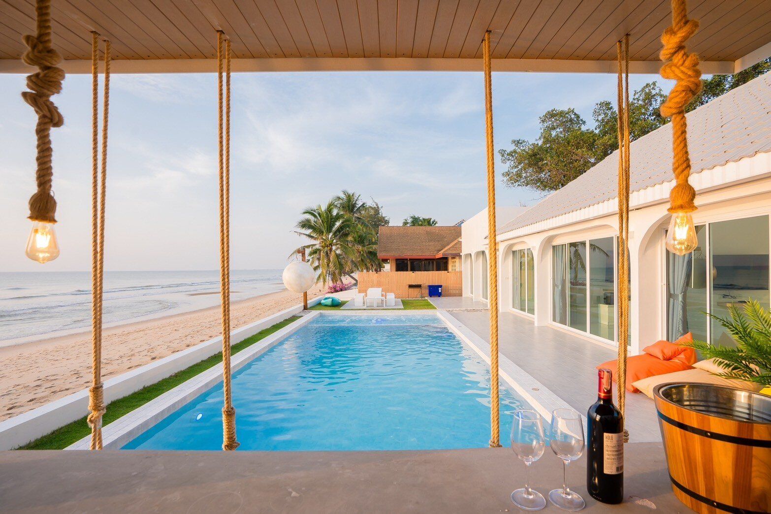 Beachfront pool viewed from the bar at Sun Sea V Pool Villa