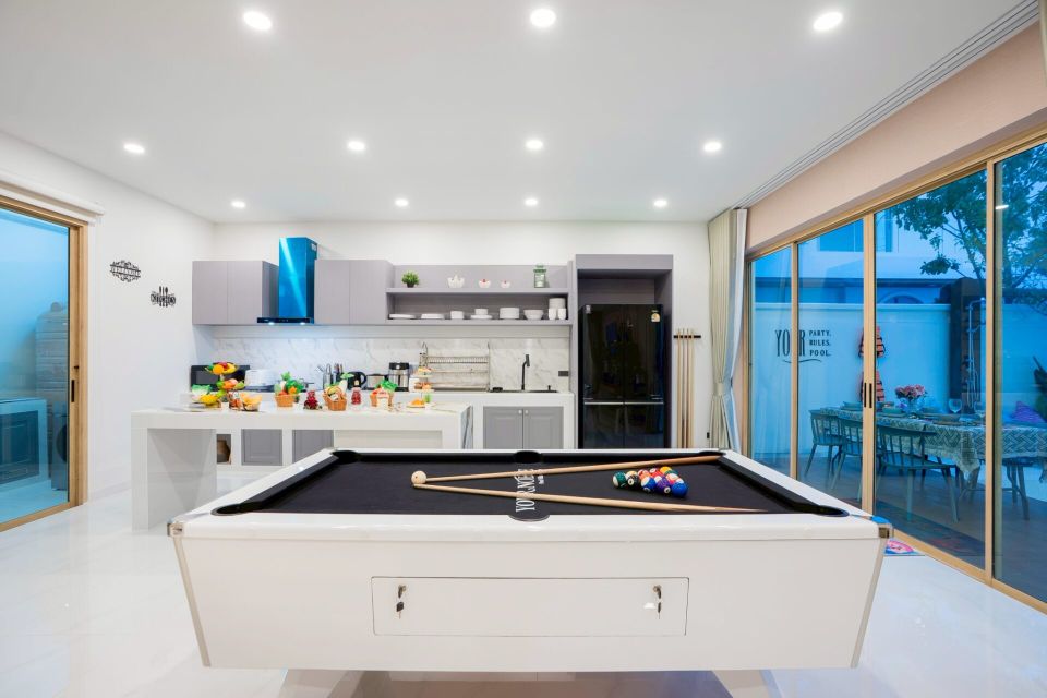 Pool table and games room at Noble V Pool Villa
