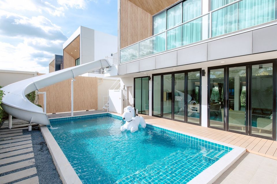 Private pool with slide and dog float at Pool Lay AII Pool Villa, Na Jomtien, Pattaya, Thailand.