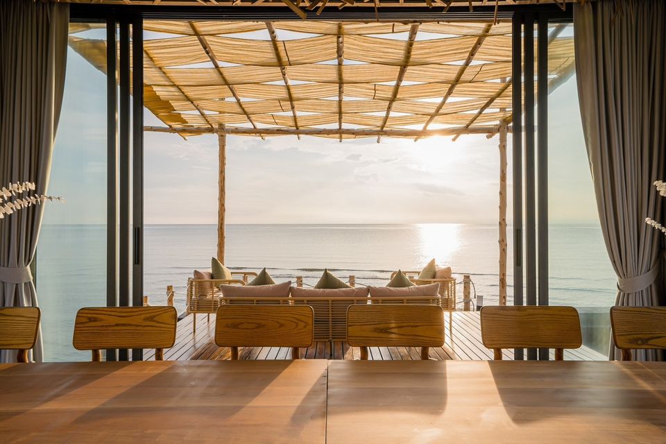 Ocean view from the dining table at Sea Fan IV Beachfront Pool Villa near Huahin airport. Coastal dining experience.