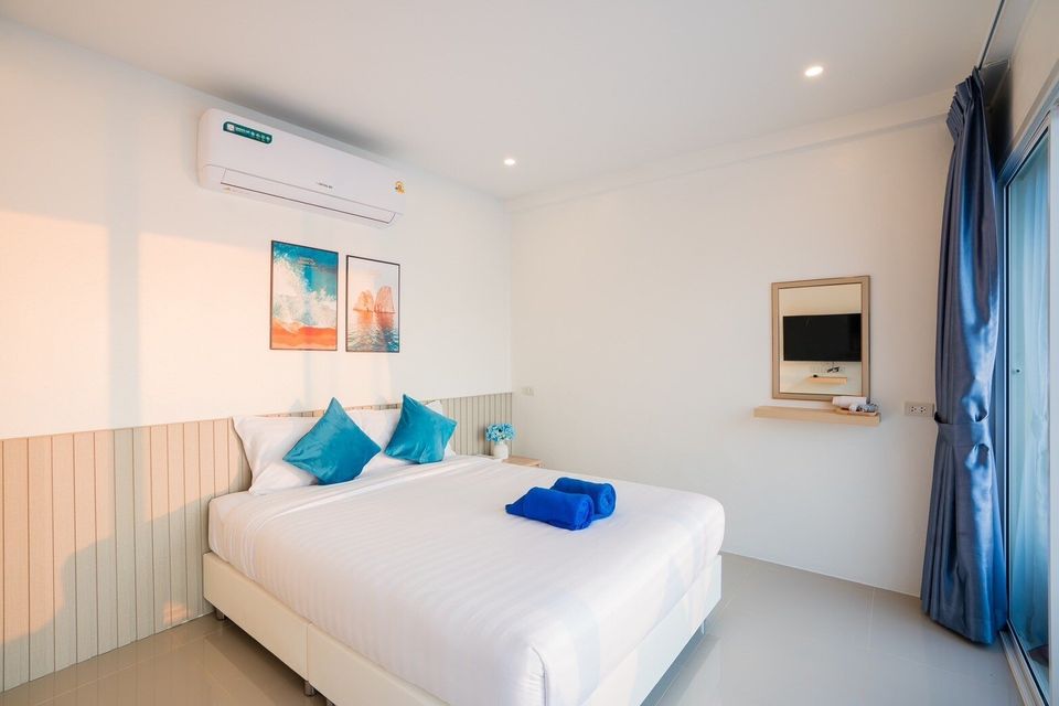King bedroom with air conditioning at Sun Sea V Pool Villa