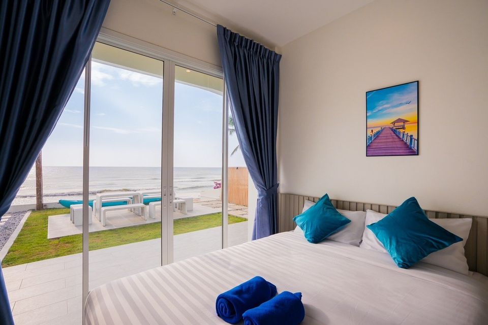 King bedroom with direct beach view at Sun Sea V Pool Villa