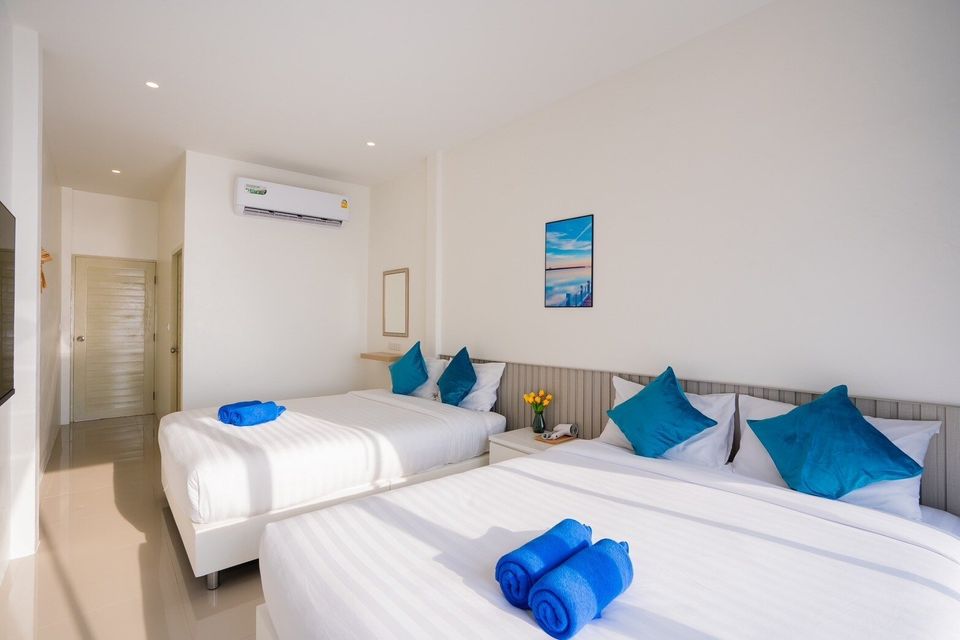 Air-conditioned twin-bed room at Sun Sea V Pool Villa