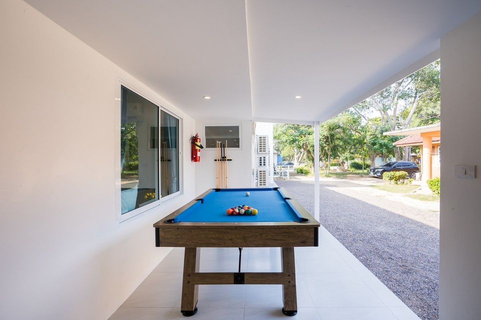 Covered outdoor pool table area at Sun Sea V Pool Villa