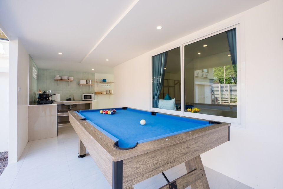 Pool table beside the open kitchen at Sun Sea V Pool Villa