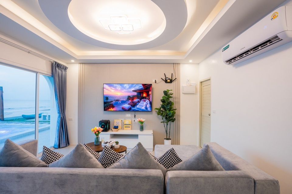 Smart TV lounge with sea view at Sun Sea V Pool Villa